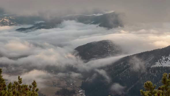 inverse weather with moving clouds,Beautiful winter landscape, morning in the mountains