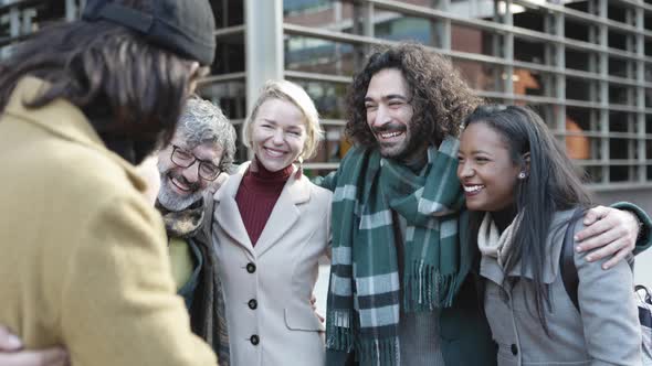 Multiracial Group of Professional Business People Laughing Together Outdoors