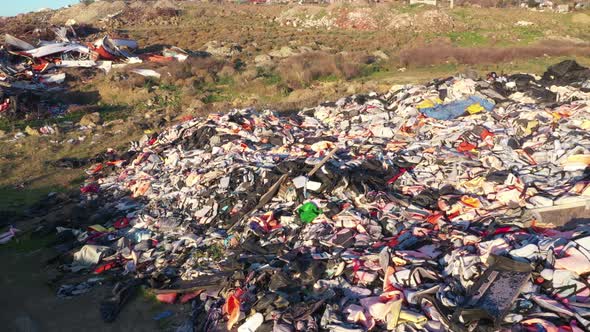 Refugee lifejackets and rubber dinghy dumped Lesvos Island Aerial