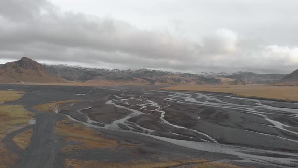 Aerial shot of a glacial river system in Iceland showing unique patterns.