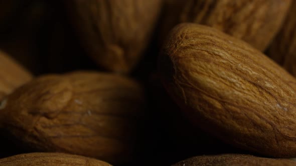 Cinematic, rotating shot of almonds on a white surface - ALMONDS 031