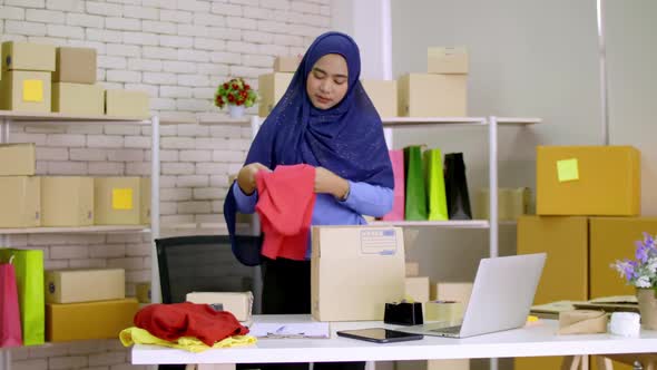 A young Muslim woman who started a small business. freelance entrepreneur working from home