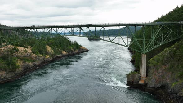 Side scrolling shot of cars commuting from Fidalgo Island to Whidbey Island.