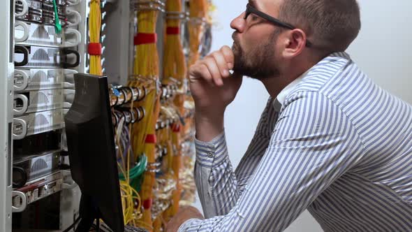 Engineer Working in Data Room