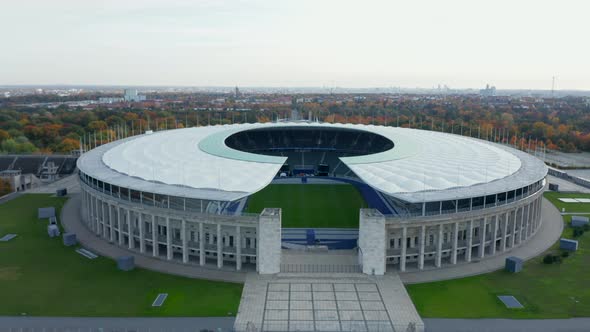 Berlin, Germany Soccer Football Stadium Establishing Shot, Slow Aerial Slide Right on Beautiful Day