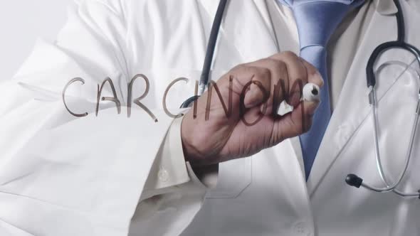 Asian Doctor Writing Carcinoma
