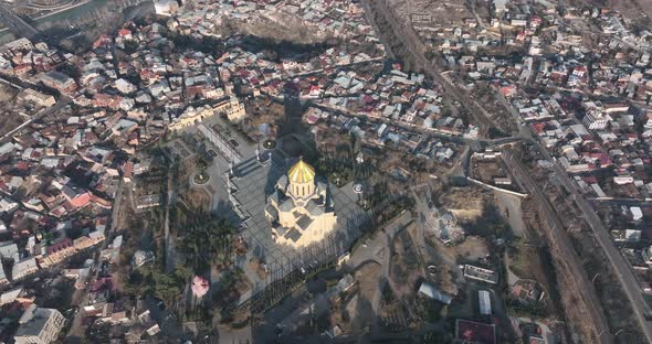 Aerial view of Holy Trinity Cathedral Sameba in Tbilisi Georgia. Sunrise drone footage.