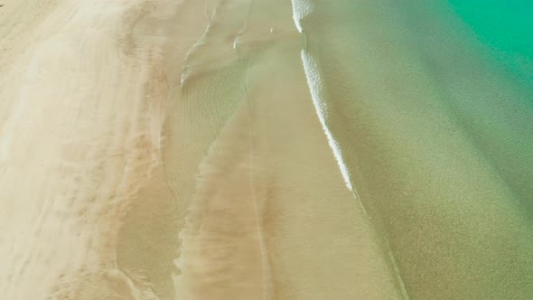 Ocean with Waves and Yellow Beach