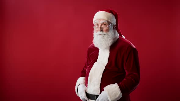 Portrait of Santa Claus Making Shhh Gesture