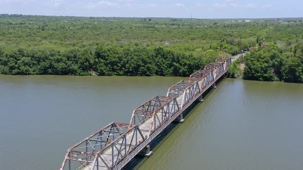 Old bridge crossing the Rio Soco in San Pedro De Macoris; aerial view