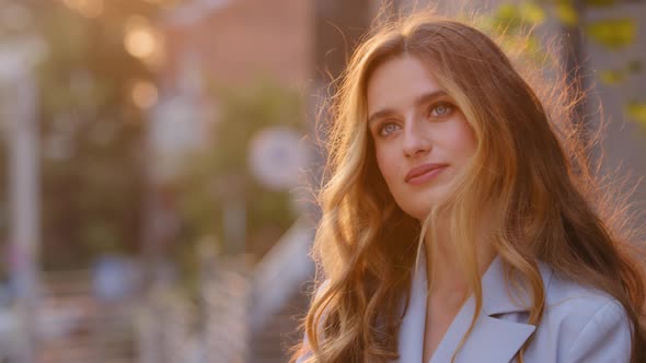 Portrait of Young Beautiful Attractive Pensive Woman Girl Caucasian Lady Student Stands on Street in