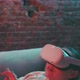 Camera moves to young woman laying on a couch wearing vr goggles - VideoHive Item for Sale