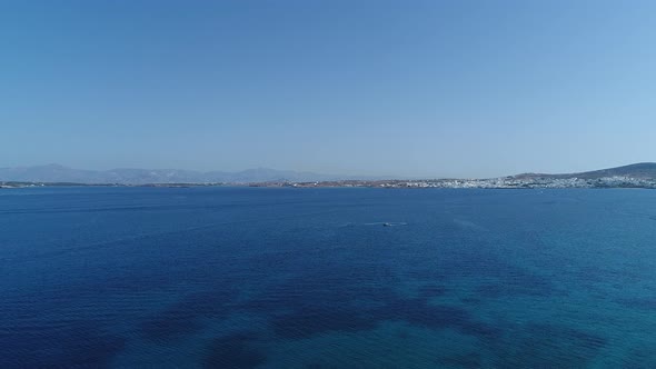 Piperi beach in Naoussa on Paros island in the Cyclades in Greece aerial view