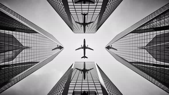 Airplane Flying Above Skyscrapers Modern City