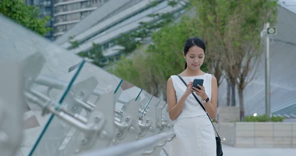 Woman use of smart phone in Hong Kong