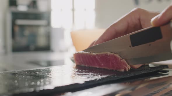 Slicing Seared Tuna Steak At Cooking Class