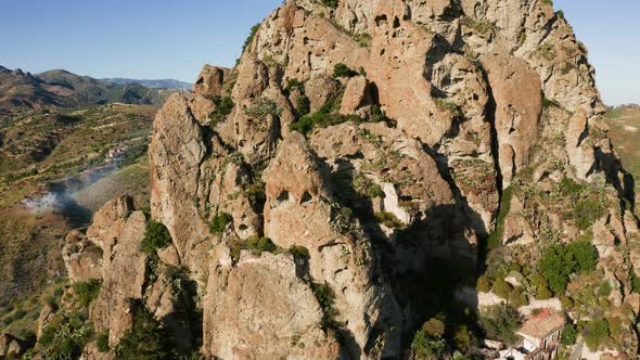 Ancient Rocks Near the Ghost Town Pentedattilo in the Mountain in Calabria