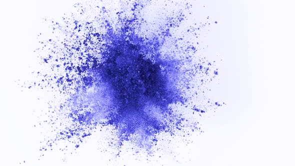 Blue powder exploding on white background in super slow motion, shot with Phantom Flex 4K