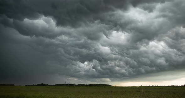 Dark Ominous Grey Storm Clouds. Dramatic Sky. Lighting In Dark Stormy Clouds Timelapse