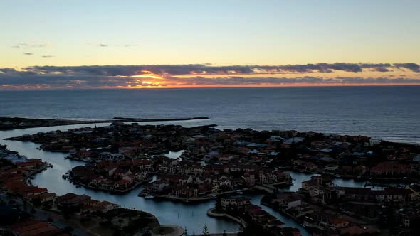 Drone timelapse of perfect sunset overlooking canals Mandurah, Western Australia.