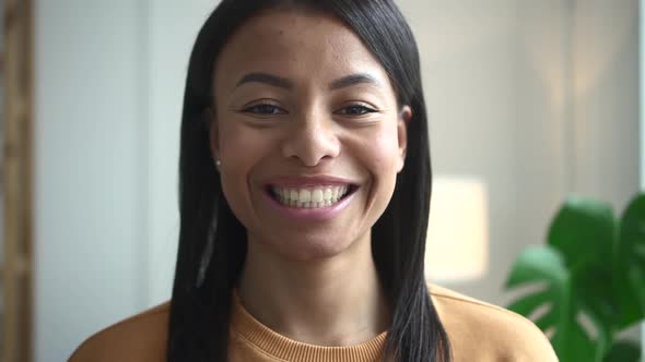 Portrait of Mixed Race Woman at Home Spbd