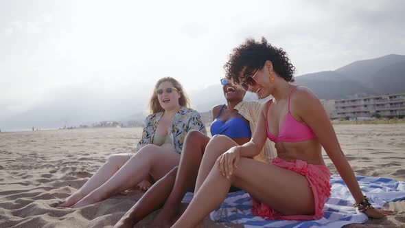 young women having fun on the beach