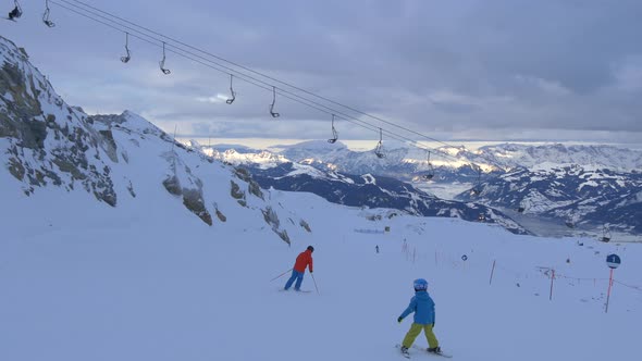 Family skiing on a ski slope