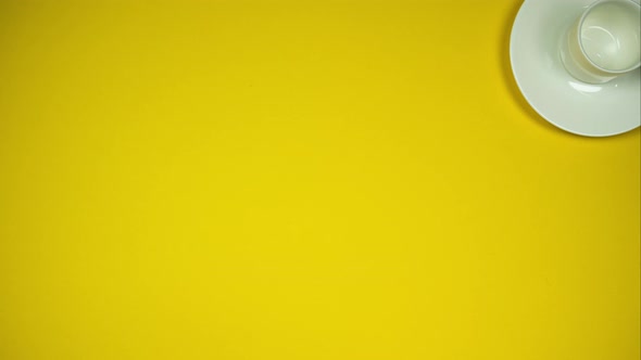 Yellow Background With Coffee Cup And Protecting Mask. Stop Motion Animation