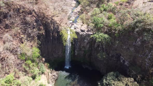 Lush Water Fall From Above And Secret Lagoon