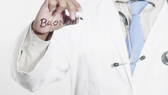 Asian Doctor Writes Bronchitis 