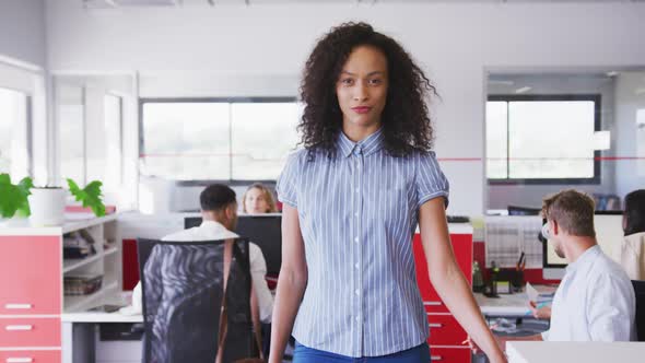 Professional businesswoman walking in modern office in slow motion