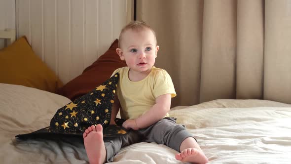 Enthusiastic One Year Old Child in a Witch Costume