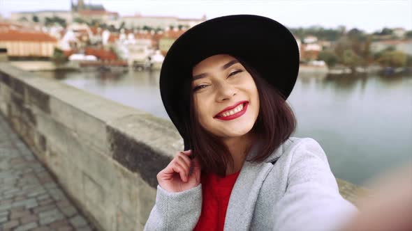 Pretty Young Girl Enjoying the Sunny Weather on the Viewpoint in Prague