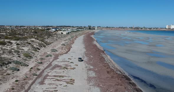 Following a car as it drives along North Beach in Wallaroo South Australia