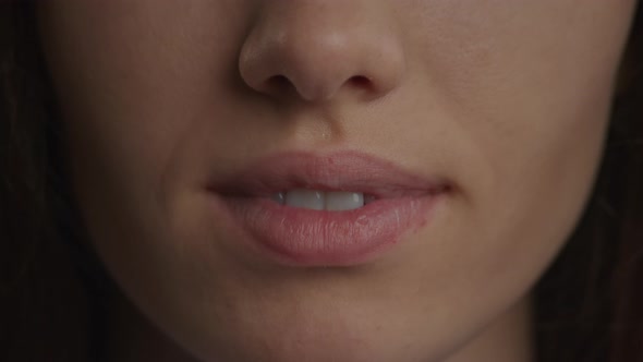 Close Up of a Caucasian Woman Confident Smile in Slow Motion