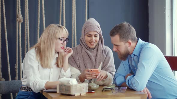 Group of Friends in a Cafe Having Great Time.