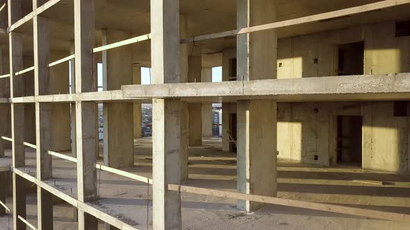 Concrete Interior Frame of Tall Apartment Building Under Construction in a City