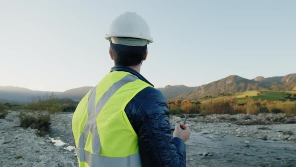 boy with high visibility harness pilots drone safely