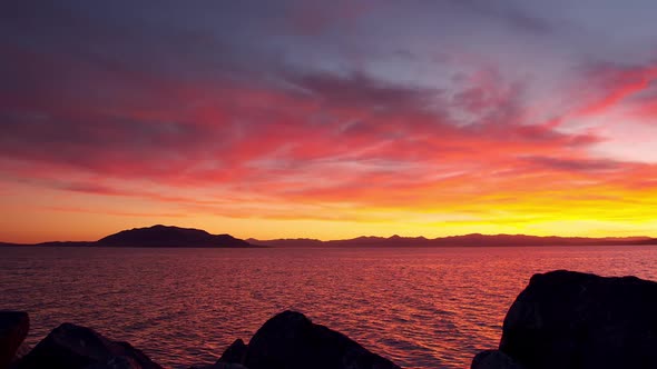 Colors reflecting from vibrant sunset over Utah Lake