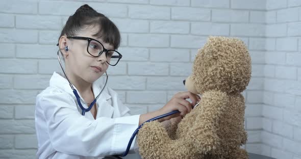 Child Listening Sick Bear