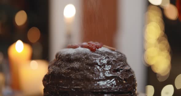 Powdering a Chocolate Pie with a Sugar Powder