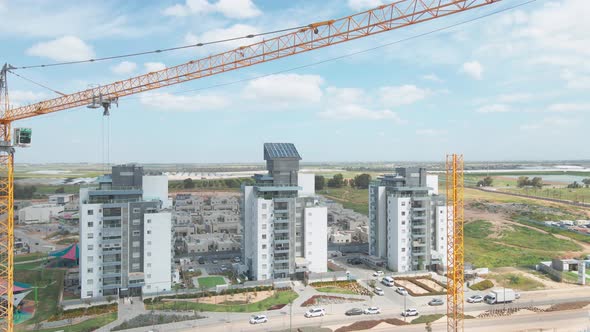 new neighborhood buildings with cranes at southern district city netivot at the state of israel