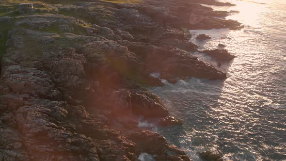 Fanad Head in Donegal Ireland fly over rocks and waves