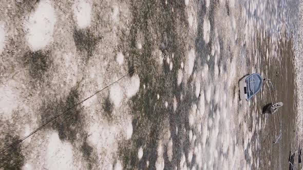 Vertical Video of Low Tide in the Ocean Near the Coast of Zanzibar Tanzania Aerial View