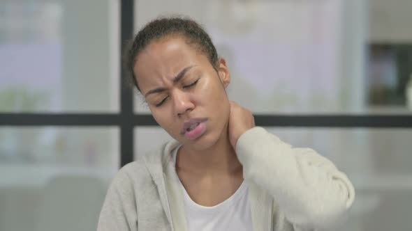 Portrait of African Woman Having Neck Pain