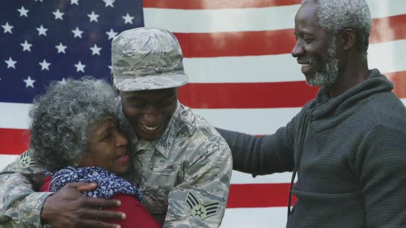 Soldier with his parents alt