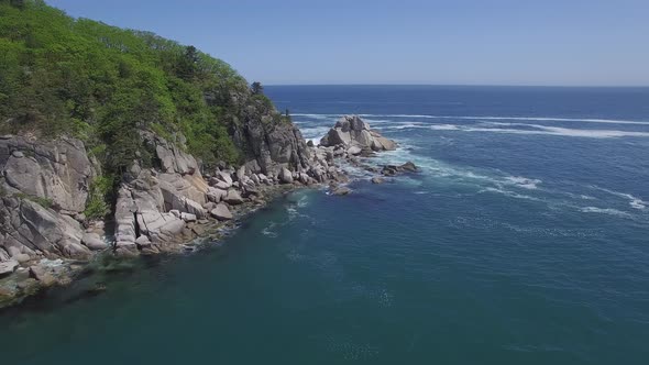 View From a Droneon a Stone Cape Washed By Strong Waves