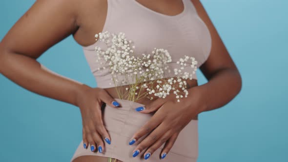 Plus Size Black Woman with Babys Breath Flower