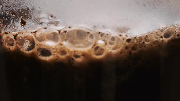 Bubbling Coffee Prepared in French Press