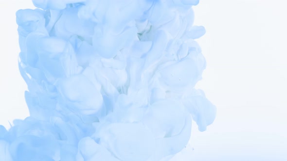 Super Slow Motion Shot of Abstract Light Blue Ink Flowing in Water at 1000Fps